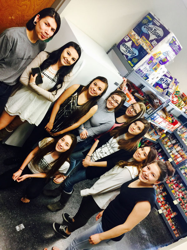 Browning High School students in the Food Pantry